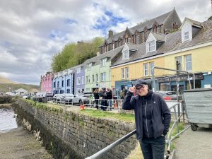 Doffing my cap in the town of Portree on the Isle of Skye in Scotland.
