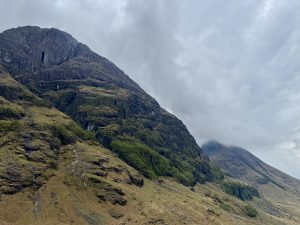 Ossian's Cave, a natural, keyhole-shaped rock cleft high on the face of Aonach Dubh (one of The Three Sisters), Glen Coe, Scotland.