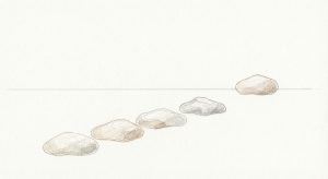 A quiet, balanced cluster of pocket rocks and smooth river stones collected from a solitary walk.